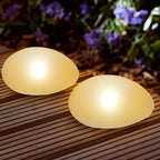 SUNNYPARK Solar Garden Lights Outdoor Set of 4 Plastic Pebble Shape Decorative Rock Lights Waterproof - Warm White