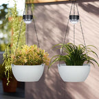 BAYN 2 Packs Solar Hanging Basket Planters for Plants Outdoor, Self Watering White Flower Plants Pots with Solar Light Drainer for Balcony Patio Garden Outdoor Decoration