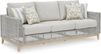 Signature Design by Ashley Seton Creek Cottage Nuvella Weather Resistant Fabric Outdoor Sofa with Cushion and 4 Throw Pillows, Light Brown & Light Gray