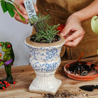Sungmor Small Ceramic Urn Planter - Blue and White Floral Pedestal Flower Pot, Decorative Vintage Chinoiserie Style Planters, Tuscan Accent Vase Indoor Outdoor Plant Holder with Drainage