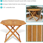Sunnydaze Folding Meranti Wood Outdoor Dining Table with Umbrella Hole - Foldable Teak Patio Table - Teak Oil Finish - Octagon